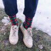 checkered funky socks on snow sikasok